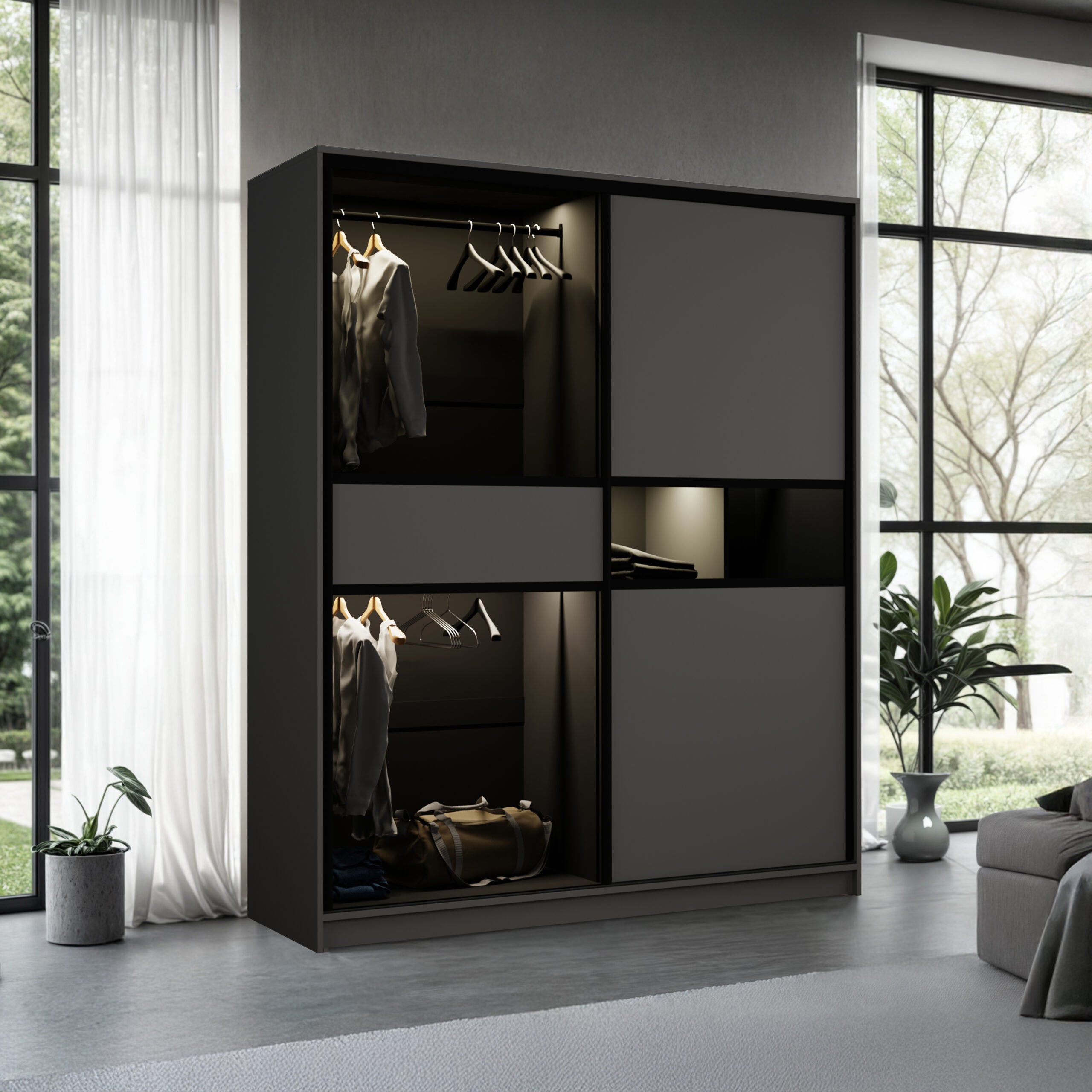 Modern wardrobe with clothes and bags in a room with large windows and plants.