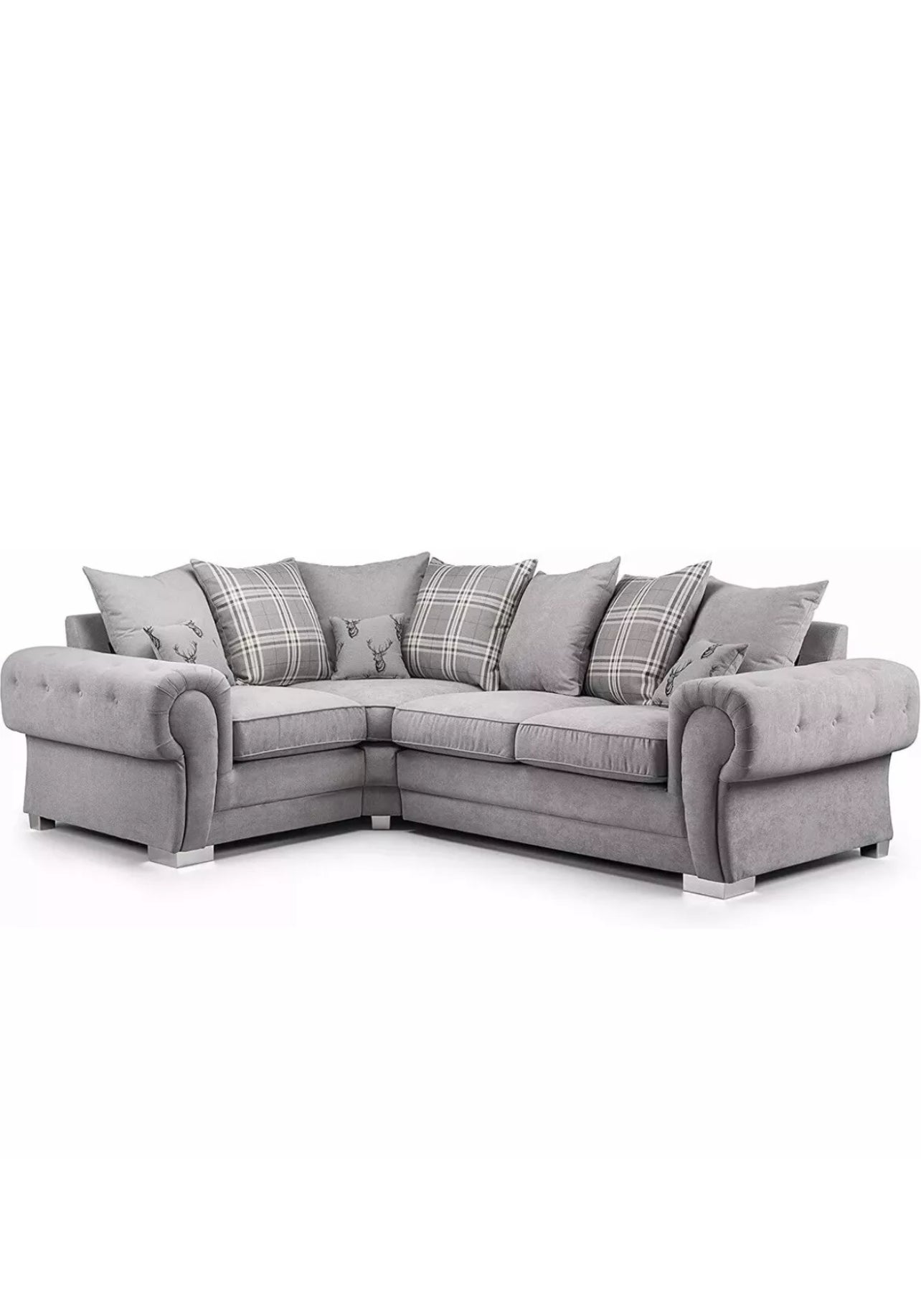 L-shaped sofa with plush back cushions and a jumbo cord finish