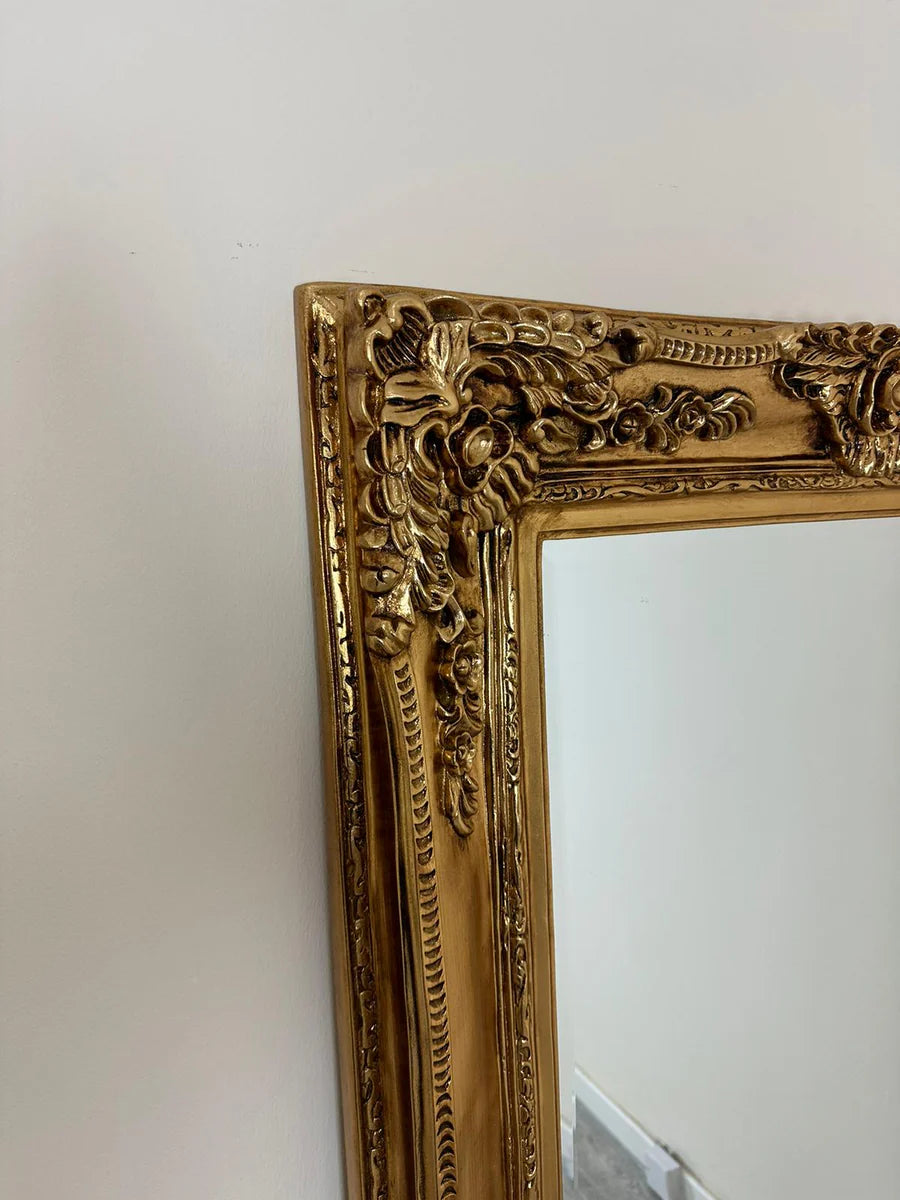 ornamental gold colour mirror
