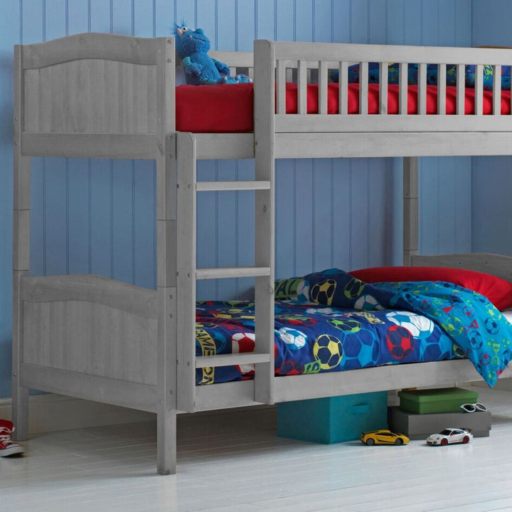 Single wooden bunk bed with mattresses